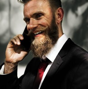what do beard oils do - beard man on phone
